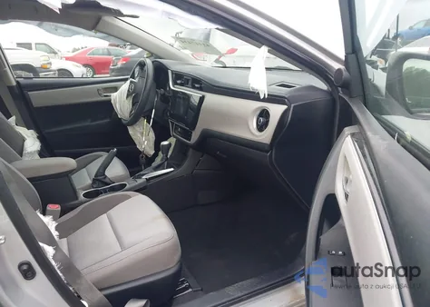 2017 Toyota Corolla Le z USA, uszkodzony, nr VIN 5YFBURHE1HP734410
